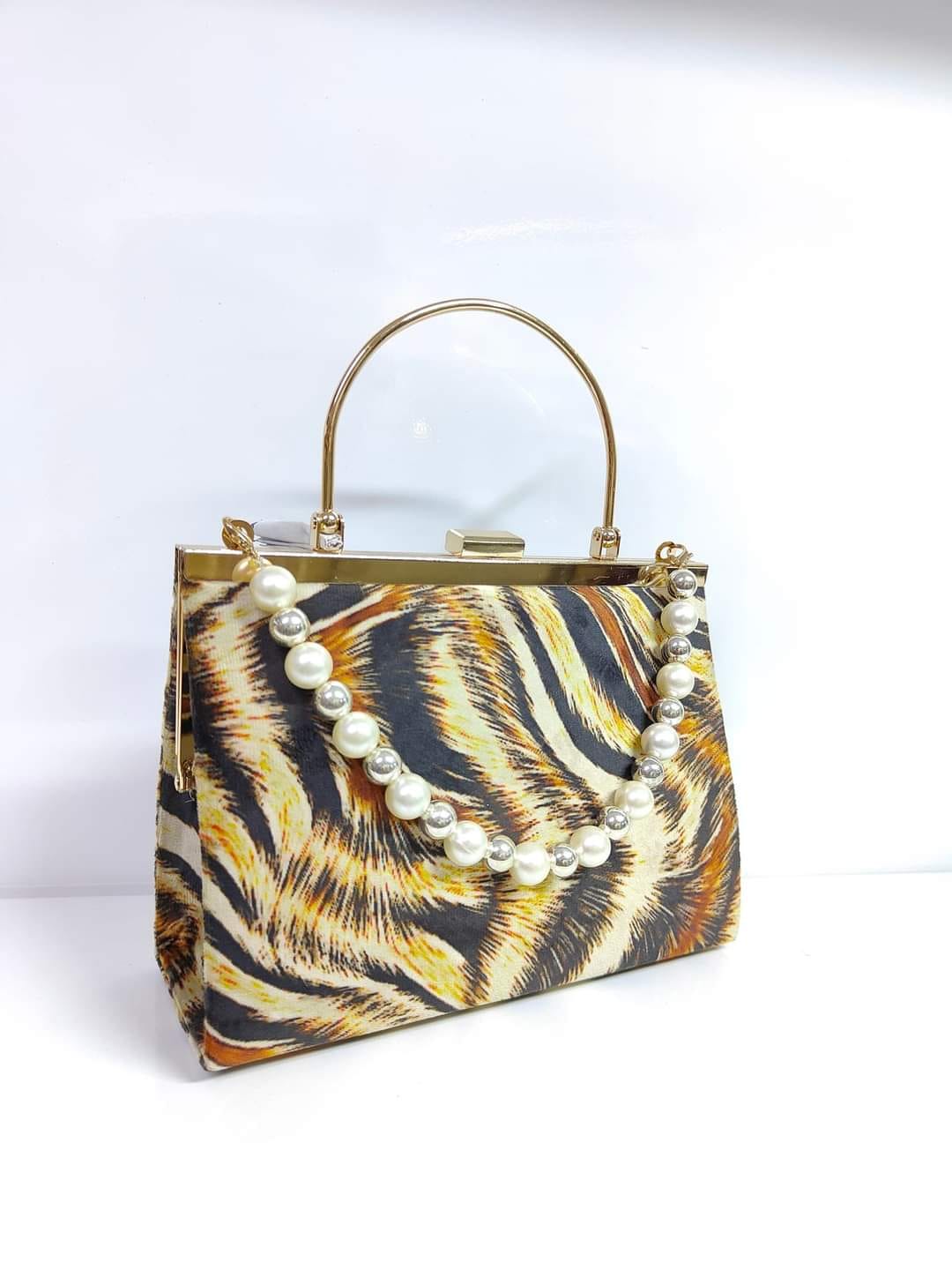 Pearl Handle Clutch — Tiger